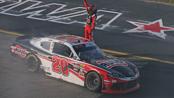 NEWTON, IOWA - JUNE 16: Christopher Bell, driver of the #20 Ruud Toyota, celebrates after winning the NASCAR Xfinity Series CircuitCity.com 250 Presented by Tamron at Iowa Speedway on June 16, 2019 in Newton, Iowa. (Photo by Matt Sullivan/Getty Images)