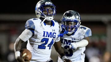IMG Academy's Kamari Wilson (24) celebrates his interception against Ravenwood with IMG Academy's Oj Burroughs (3) tduring the second half at Ravenwood High School in Brentwood, Tenn., Friday, Sept. 25, 2020.Rhs Img 092520 An 027