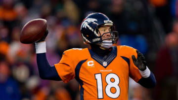 DENVER, CO - DECEMBER 8: Quarterback Peyton Manning #18 of the Denver Broncos throws a pass during the third quarter against the Tennessee Titans at Sports Authority Field Field at Mile High on December 8, 2013 in Denver, Colorado. The Broncos defeated the Titans 51-28. (Photo by Justin Edmonds/Getty Images)