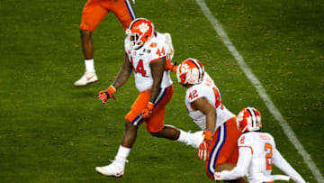 SANTA CLARA, CALIFORNIA - JANUARY 07: Nyles Pinckney #44 of the Clemson Tigers celebrates after tackling to stop a fourth down conversion by Alabama Crimson Tide during the third quarter in the College Football Playoff National Championship at Levi's Stadium on January 07, 2019 in Santa Clara, California. (Photo by Lachlan Cunningham/Getty Images)