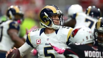 Oct 4, 2015; Glendale, AZ, USA; St. Louis Rams quarterback Nick Foles (5) passes the ball against the Arizona Cardinals during the first half at University of Phoenix Stadium. Mandatory Credit: Joe Camporeale-USA TODAY Sports