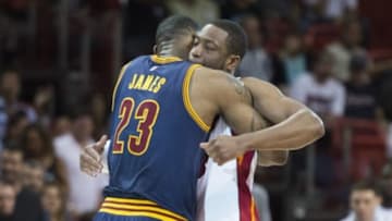 Mar 16, 2015; Miami, FL, USA; Cleveland Cavaliers forward LeBron James (23) and Miami Heat guard Dwyane Wade (3) hug before the game at American Airlines Arena. Mandatory Credit: Tommy Gilligan-USA TODAY Sports