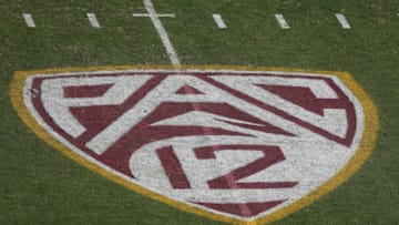 TEMPE, AZ - OCTOBER 19: The "Pac 12" logo is displayed on the filed during the college football game between the Washington Huskies and the Arizona State Sun Devils at Sun Devil Stadium on October 19, 2013 in Tempe, Arizona. The Sun Devils defeated the Huskies 53-24. (Photo by Christian Petersen/Getty Images)