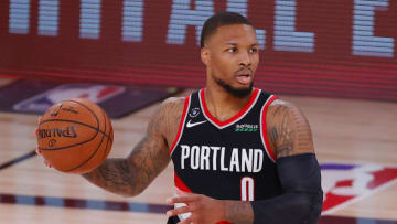 LAKE BUENA VISTA, FLORIDA - AUGUST 04: Damian Lillard #0 of the Portland Trail Blazers dribbles during the second half against the Houston Rockets at The Arena at ESPN Wide World Of Sports Complex on August 04, 2020 in Lake Buena Vista, Florida. NOTE TO USER: User expressly acknowledges and agrees that, by downloading and or using this photograph, User is consenting to the terms and conditions of the Getty Images License Agreement. (Photo by Kevin C. Cox/Getty Images)