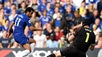 LONDON, ENGLAND - AUGUST 18: Petr Cech of Arsenal saves a shot from Pedro of Chelsea during the Premier League match between Chelsea FC and Arsenal FC at Stamford Bridge on August 18, 2018 in London, United Kingdom. (Photo by Mike Hewitt/Getty Images)