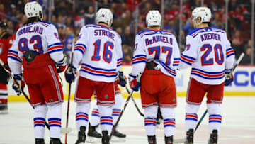 NEWARK, NJ - APRIL 01: New York Rangers center Mika Zibanejad (93), New York Rangers center Ryan Strome (16), New York Rangers defenseman Tony DeAngelo (77) and New York Rangers left wing Chris Kreider (20) during the first period of the National Hockey League game between the New Jersey Devils and the New York Rangers on April 1, 2019 at the Prudential Center in Newark, NJ. (Photo by Rich Graessle/Icon Sportswire via Getty Images)