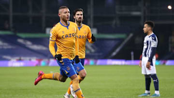 Everton's Brazilian striker Richarlison (L) celebrates scoring the opening goal during the English Premier League football match between West Bromwich Albion and Everton at The Hawthorns stadium in West Bromwich, central England, on March 4, 2021. (Photo by Alex Pantling / POOL / AFP) / RESTRICTED TO EDITORIAL USE. No use with unauthorized audio, video, data, fixture lists, club/league logos or 'live' services. Online in-match use limited to 120 images. An additional 40 images may be used in extra time. No video emulation. Social media in-match use limited to 120 images. An additional 40 images may be used in extra time. No use in betting publications, games or single club/league/player publications. / (Photo by ALEX PANTLING/POOL/AFP via Getty Images)