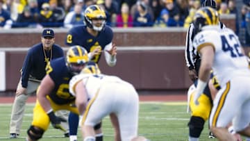Apr 1, 2016; Ann Arbor, MI, USA; Michigan Wolverines head coach Jim Harbaugh looks on as quarterback John O