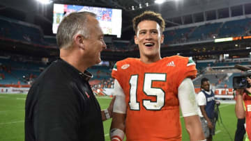 Nov 26, 2016; Miami Gardens, FL, USA; Miami Hurricanes head coach Mark Richt (left) shakes hands with Miami Hurricanes quarterback Brad Kaaya (right) after defeating the Duke Blue Devils 40-21 at Hard Rock Stadium. Mandatory Credit: Steve Mitchell-USA TODAY Sports
