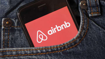 PARIS, FRANCE - NOVEMBER 21: In this photo illustration, the Airbnb logo is displayed on the screen of an iPhone on November 21, 2019 in Paris, France. French hoteliers have announced that they will suspend their participation in the organization of the Olympics Games 2024, a decision taken to protest against the partnership established by the International Olympic Committee (IOC) with the Airbnb platform. (Photo by Chesnot/Getty Images)
