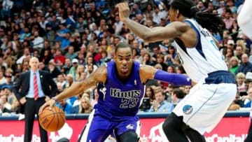 Jan 31, 2014; Dallas, TX, USA; Sacramento Kings shooting guard Marcus Thornton (23) dribbles as Dallas Mavericks small forward Jae Crowder (9) defends during the game at American Airlines Center. Dallas won 107-103. Mandatory Credit: Kevin Jairaj-USA TODAY Sports