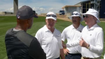 Aug 21, 2014; Englewood, CO, USA; Denver Broncos coach John Fox (second from left) talks with Houston Texans general manager Rick Smith (left), chief operating officer D. Cal McNair (second from right) and owner Bob McNair (right) during scrimmage against the Denver Broncos at the Broncos Headquarters. Mandatory Credit: Kirby Lee-USA TODAY Sports