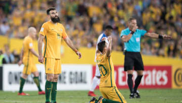 SYDNEY, AUSTRALIA - NOVEMBER 15: Mile Jedinak and Trent Sainsbury of Australia celebrate victory during the 2018 FIFA World Cup Qualifiers Leg 2 match between the Australian Socceroos and Honduras at ANZ Stadium on November 15, 2017 in Sydney, Australia. (Photo by Mark Kolbe/Getty Images)