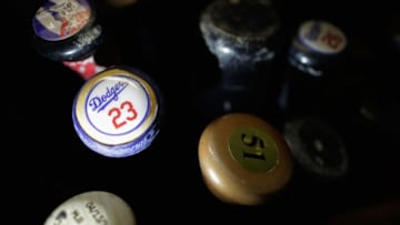 CHICAGO, IL - OCTOBER 22: The bat of Adrian Gonzalez (Photo by Jamie Squire/Getty Images)