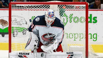 VANCOUVER, BC - MARCH 31: Joonas Korpisalo #70 of the Columbus Blue Jackets makes a save during their NHL game against the Vancouver Canucks at Rogers Arena March 31, 2018 in Vancouver, British Columbia, Canada. (Photo by Jeff Vinnick/NHLI via Getty Images)"n