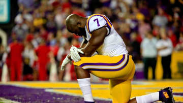 Oct 22, 2016; Baton Rouge, LA, USA; LSU Tigers running back Leonard Fournette (7) kneels prior to kickoff of a game against the Mississippi Rebels at Tiger Stadium. Mandatory Credit: Derick E. Hingle-USA TODAY Sports