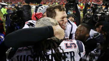 KANSAS CITY, MISSOURI - JANUARY 20: Tom Brady #12 of the New England Patriots celebrates with Dont'a Hightower #54 after defeating the Kansas City Chiefs in overtime during the AFC Championship Game at Arrowhead Stadium on January 20, 2019 in Kansas City, Missouri. The Patriots defeated the Chiefs 37-31. (Photo by Patrick Smith/Getty Images)