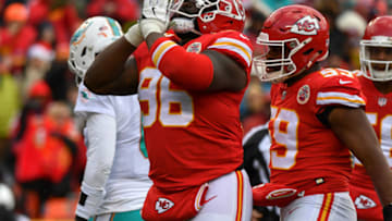 KANSAS CITY, MO - DECEMBER 24: Nose tackle Bennie Logan #96 of the Kansas City Chiefs celebrates a tackle in the backfield during the third quarter of the game against the Miami Dolphins at Arrowhead Stadium on December 24, 2017 in Kansas City, Missouri. ( Photo by Peter Aiken/Getty Images )
