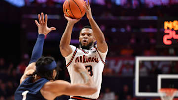 Dec 10, 2022; Champaign, Illinois, USA; Illinois Fighting Illini guard Jayden Epps (3) shoots the ball over Penn State Nittany Lions guard Seth Lundy (1) during the first half at State Farm Center. Mandatory Credit: Ron Johnson-USA TODAY Sports
