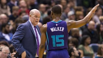 Mar 26, 2016; Milwaukee, WI, USA; Charlotte Hornets head coach Steve Clifford talks with guard Kemba Walker (15) during the third quarter against the Milwaukee Bucks at BMO Harris Bradley Center. Mandatory Credit: Jeff Hanisch-USA TODAY Sports