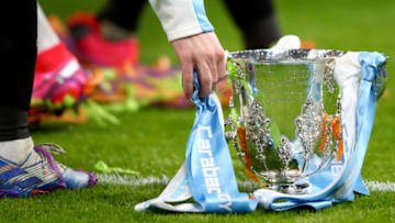 LONDON, ENGLAND - MARCH 01: Detail of the trophy dressed in the colours of Manchester City during the Carabao Cup Final between Aston Villa and Manchester City at Wembley Stadium on March 1, 2020 in London, England. (Photo by Marc Atkins/Getty Images)