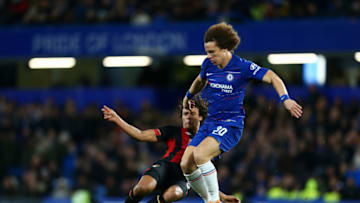 LONDON, ENGLAND - DECEMBER 19: David Luiz of Chelsea is challenged by Nathan Ake of AFC Bournemouth during the Carabao Cup Quarter Final match between Chelsea and AFC Bournemouth at Stamford Bridge on December 19, 2018 in London, United Kingdom. (Photo by Jordan Mansfield/Getty Images)