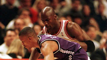 19 Mar 1996: Guard Michael Jordan of the Chicago bulls plays pressure defense on point guard Tyus Edney of the Sacramento Kings as he dribbles down court during the first quarter of action in the Bulls game against the Kings at the United Center in Chic