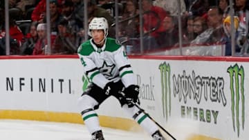 NEWARK, NJ - OCTOBER 16: Miro Heiskanen #4 of the Dallas Stars plays the puck during the game against the New Jersey Devils at Prudential Center on October 16, 2018 in Newark, New Jersey. (Photo by Andy Marlin/NHLI via Getty Images)