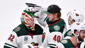 ANAHEIM, CA - NOVEMBER 09: Minnesota Wild goalie Devan Dubnyk (40) congratulates goalie Alex Stalock (32) after the Wild defeated the Anaheim Ducks 5 to 1 in a game played on November 11, 2018 at the Honda Center in Anaheim, CA. (Photo by John Cordes/Icon Sportswire via Getty Images)