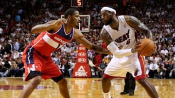 Mar 10, 2014; Miami, FL, USA; Miami Heat small forward LeBron James (6) is defended by Washington Wizards small forward Trevor Ariza (1) in the second half at American Airlines Arena. Mandatory Credit: Robert Mayer-USA TODAY Sports