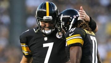 Aug 16, 2014; Pittsburgh, PA, USA; Pittsburgh Steelers quarterback Ben Roethlisberger (7) celebrates a touchdown with wide receiver Markus Wheaton (11) during the first half against the Buffalo Bills at Heinz Field. Mandatory Credit: Jason Bridge-USA TODAY Sports