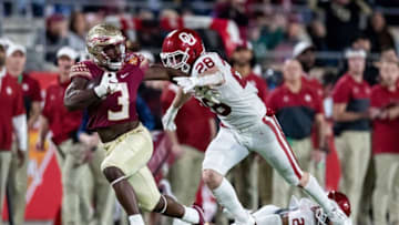 Florida State Seminoles running back Trey Benson (3) pushes off a defender as he sprints for the end zone The Florida State Seminoles defeated the Oklahoma Sooners 35-32 in the Cheez-It Bowl at Camping World Stadium on Thursday, Dec. 29, 2022.Fsu V Oklahoma Second Half432