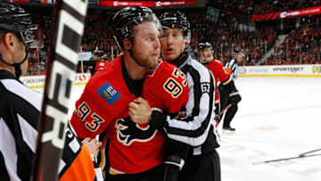 CALGARY, AB - NOVEMBER 1: Sam Bennett #93 of the Calgary Flames is separated after a fight with Ian Cole #28 of the Colorado Avalanche during an NHL game on November 1, 2018 at the Scotiabank Saddledome in Calgary, Alberta, Canada. (Photo by Gerry Thomas/NHLI via Getty Images)