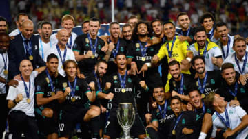 SKOPJE, MACEDONIA - AUGUST 08: The Real Madrid team celebrate with UEFA Super Cup trophy after the UEFA Super Cup final between Real Madrid and Manchester United at the Philip II Arena on August 8, 2017 in Skopje, Macedonia. (Photo by Dan Mullan/Getty Images)
