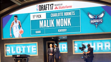 NEW YORK, USA - JUNE 22: NBA commissioner Adam Silver (L) and Charlotte Hornets' pick Malik Monk (R) during Draft 2017 in Barclays Center in Brooklyn borough of New York, United States on June 22, 2017. (Photo by Mohammed Elshamy/Anadolu Agency/Getty Images)