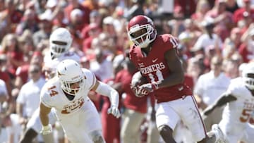 Oct 8, 2016; Dallas, TX, USA; Oklahoma Sooners wide receiver Dede Westbrook (11) runs for a touchdown after making a catch in the third quarter against the Texas Longhorns at Cotton Bowl. Oklahoma won 45-40. Mandatory Credit: Tim Heitman-USA TODAY Sports