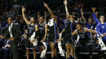 MIAMI, FLORIDA - JANUARY 04: Tre Jones #3, Cassius Stanley #2, Vernon Carey Jr. #1, Wendell Moore Jr. #0 and Javin DeLaurier #12 of the Duke Blue Devils react after a basket against the Miami Hurricanes during the second half at the Watsco Center on January 04, 2020 in Miami, Florida. (Photo by Michael Reaves/Getty Images)