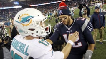 Oct 29, 2015; Foxborough, MA, USA; New England Patriots quarterback Tom Brady (12) and Miami Dolphins quarterback Ryan Tannehill (17) shake hands following an NFL game at Gillette Stadium. Mandatory Credit: Stew Milne-USA TODAY Sports