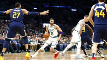 BOSTON, MASSACHUSETTS - MARCH 06: Jayson Tatum #0 of the Boston Celtics brings the ball up court during the first quarter of the game against the Utah Jazz at TD Garden on March 06, 2020 in Boston, Massachusetts. NOTE TO USER: User expressly acknowledges and agrees that, by downloading and or using this photograph, User is consenting to the terms and conditions of the Getty Images License Agreement. (Photo by Omar Rawlings/Getty Images)
