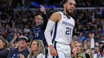 MEMPHIS, TENNESSEE - JANUARY 08: Tyus Jones #21 of the Memphis Grizzlies reacts during the game against the Utah Jazz at FedExForum on January 08, 2023 in Memphis, Tennessee. NOTE TO USER: User expressly acknowledges and agrees that, by downloading and or using this photograph, User is consenting to the terms and conditions of the Getty Images License Agreement. (Photo by Justin Ford/Getty Images)