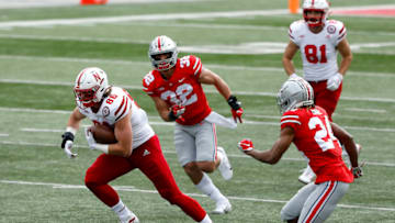 Oct 24, 2020; Columbus, Ohio, USA; Nebraska Cornhuskers tight end Jack Stoll (86) picks up the first down as he is defended by Ohio State Buckeyes linebacker Tuf Borland (32) and cornerback Shaun Wade (24) during the second quarter at Ohio Stadium. Mandatory Credit: Joseph Maiorana-USA TODAY Sports