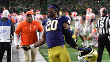 SOUTH BEND, INDIANA - NOVEMBER 07: Safety Shaun Crawford #20 of the Notre Dame Fighting Irish celebrates after defeating the Clemson Tigers 47-40 in double overtime at Notre Dame Stadium on November 7, 2020 in South Bend, Indiana. (Photo by Matt Cashore-Pool/Getty Images)