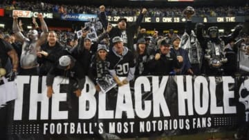 November 20, 2014; Oakland, CA, USA; Oakland Raiders fans celebrate during the second quarter against the Kansas City Chiefs at O.co Coliseum. Mandatory Credit: Kyle Terada-USA TODAY Sports