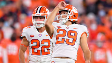 Oct 15, 2021; Syracuse, New York, USA; Clemson Tigers place kicker B.T. Potter (29) watches his field goal with wide receiver Will Swinney (22) against the Syracuse Orange during the first half at the Carrier Dome. Mandatory Credit: Rich Barnes-USA TODAY Sports