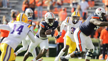 Auburn footballOct 31, 2020; Auburn, Alabama, USA; Auburn Tigers running back Tank Bigsby (4) carries against the LSU Tigers during the first quarter at Jordan-Hare Stadium. Mandatory Credit: John Reed-USA TODAY Sports