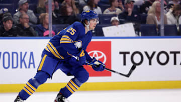 Apr 14, 2022; Buffalo, New York, USA; Buffalo Sabres defenseman Owen Power (25) skates for a loose puck during the third period against the St. Louis Blues at KeyBank Center. Mandatory Credit: Timothy T. Ludwig-USA TODAY Sports