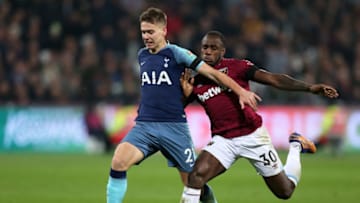31st October 2018, London Stadium, London, England; Carabao Cup football, fourth round, West Ham United versus Tottenham Hotspur; Juan Foyth of Tottenham Hotspur breaks from Michail Antonio of West Ham United (photo by John Patrick Fletcher/Action Plus via Getty Images)