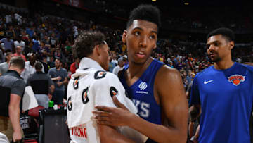 LAS VEGAS, NV - JULY 7: Trae Young #11 of the Atlanta Hawks and Allonzo Trier #14 of the New York Knicks hug after the game during the 2018 Las Vegas Summer League on July 7, 2018 at the Thomas & Mack Center in Las Vegas, Nevada. NOTE TO USER: User expressly acknowledges and agrees that, by downloading and/or using this Photograph, user is consenting to the terms and conditions of the Getty Images License Agreement. Mandatory Copyright Notice: Copyright 2018 NBAE (Photo by Garrett Ellwood/NBAE via Getty Images)