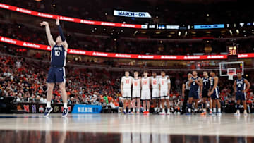 Penn State Nittany Lions guard Andrew Funk (10) shoots a free throw after a technical is called on Illinois Fighting Illini forward Dain Dainja (42) during the Big Ten Men’s Basketball Tournament game, Thursday, March 9, 2023, at United Center in Chicago. Penn State Nittany Lions won 79-76.Psuill030923 Am12820