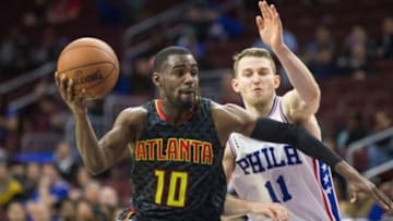 Feb 3, 2016; Philadelphia, PA, USA; Atlanta Hawks guard Tim Hardaway Jr. (10) drives past Philadelphia 76ers guard Nik Stauskas (11) during the second half at Wells Fargo Center. The Atlanta Hawks won 124-86. Mandatory Credit: Bill Streicher-USA TODAY Sports